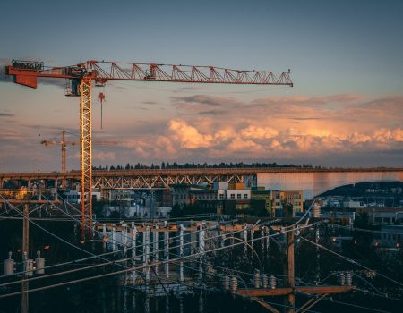 beautiful view of a construction site in a city during sunset