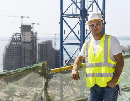 outdoor construction worker standing high altitude